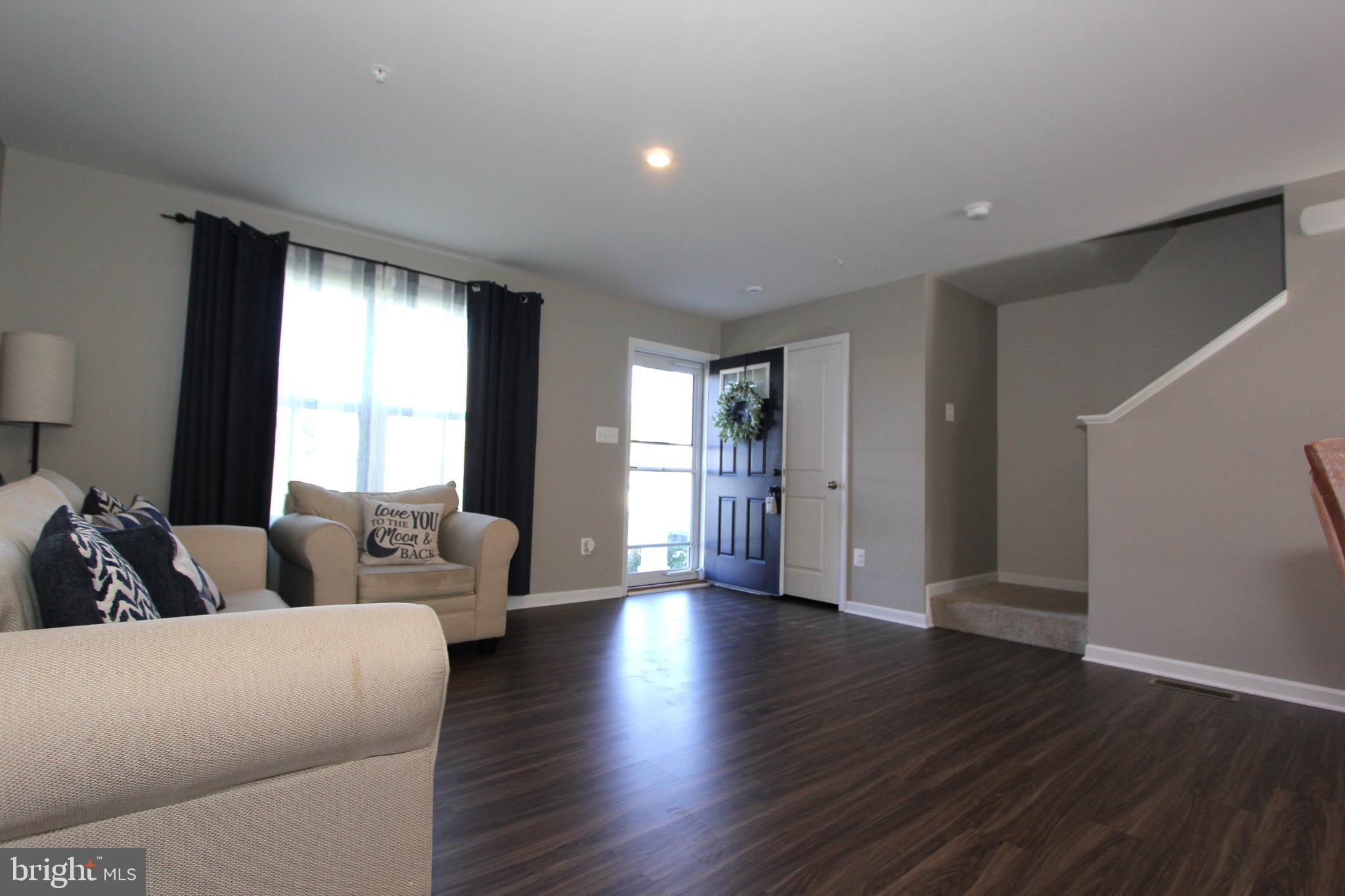 124 Boswell Boulevard Smithsburg, MD 21783 - Photo 7 of 42 Huge great room with plank vinyl floors