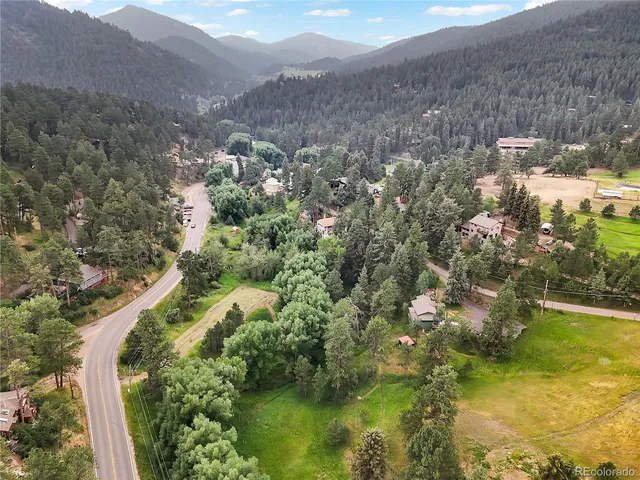 a view of a lake with mountains in the background