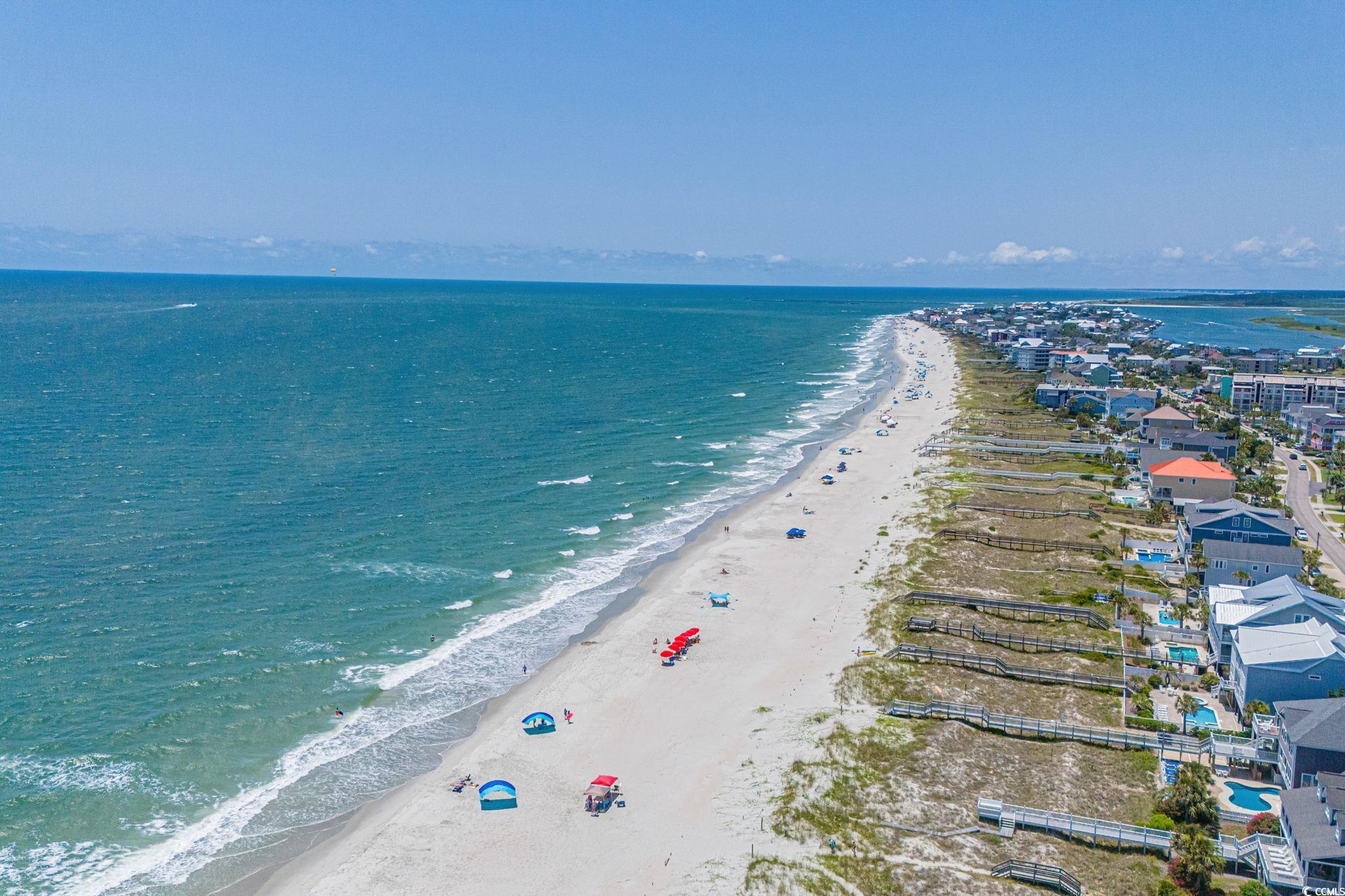 8069 Resin Road Murrells Inlet, SC 29576 - Photo 40 of 40 Drone / aerial view of waterfront with a beach