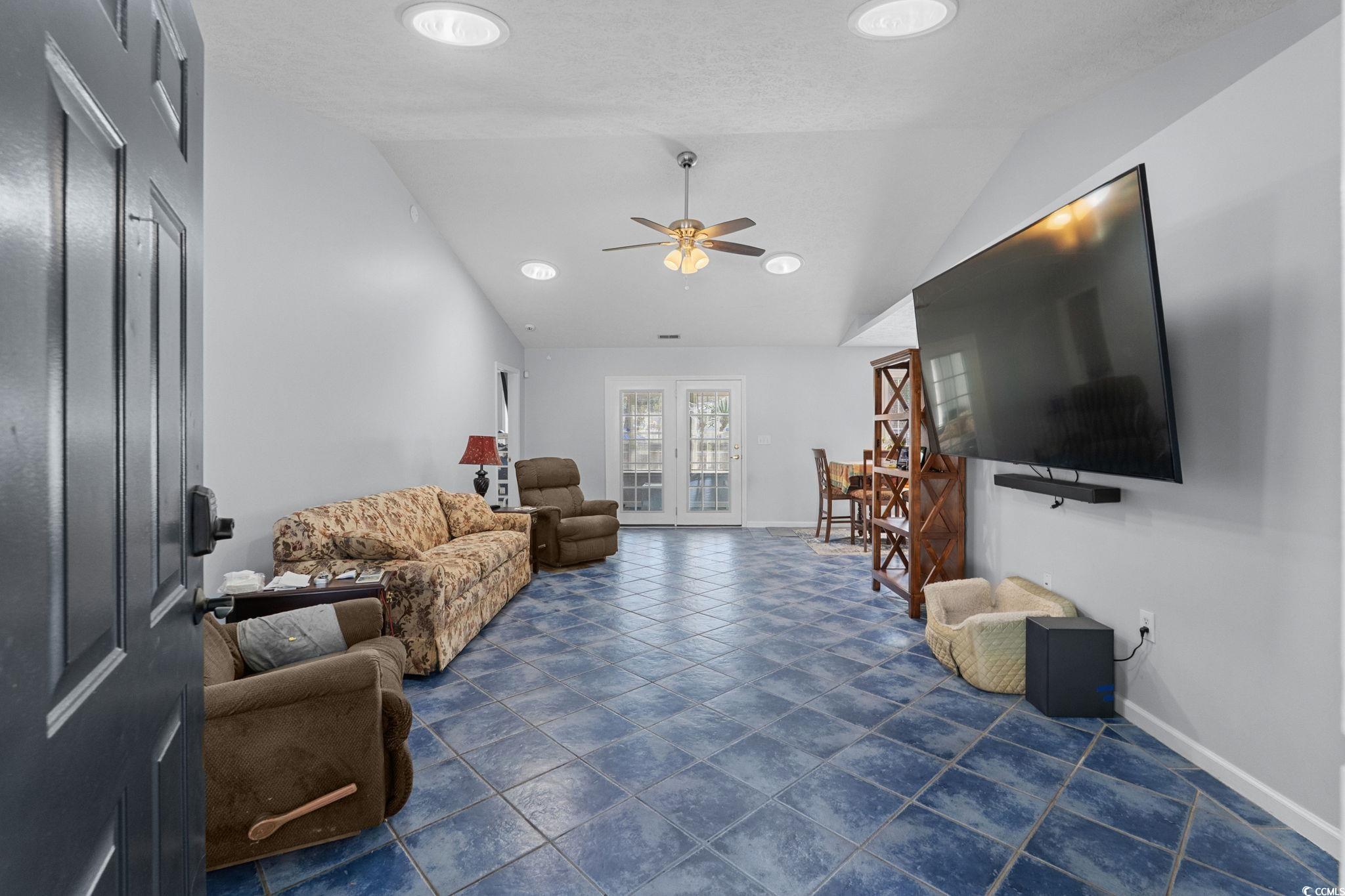8069 Resin Road Murrells Inlet, SC 29576 - Photo 5 of 40 Living area with lofted ceiling, ceiling fan, and recessed lighting