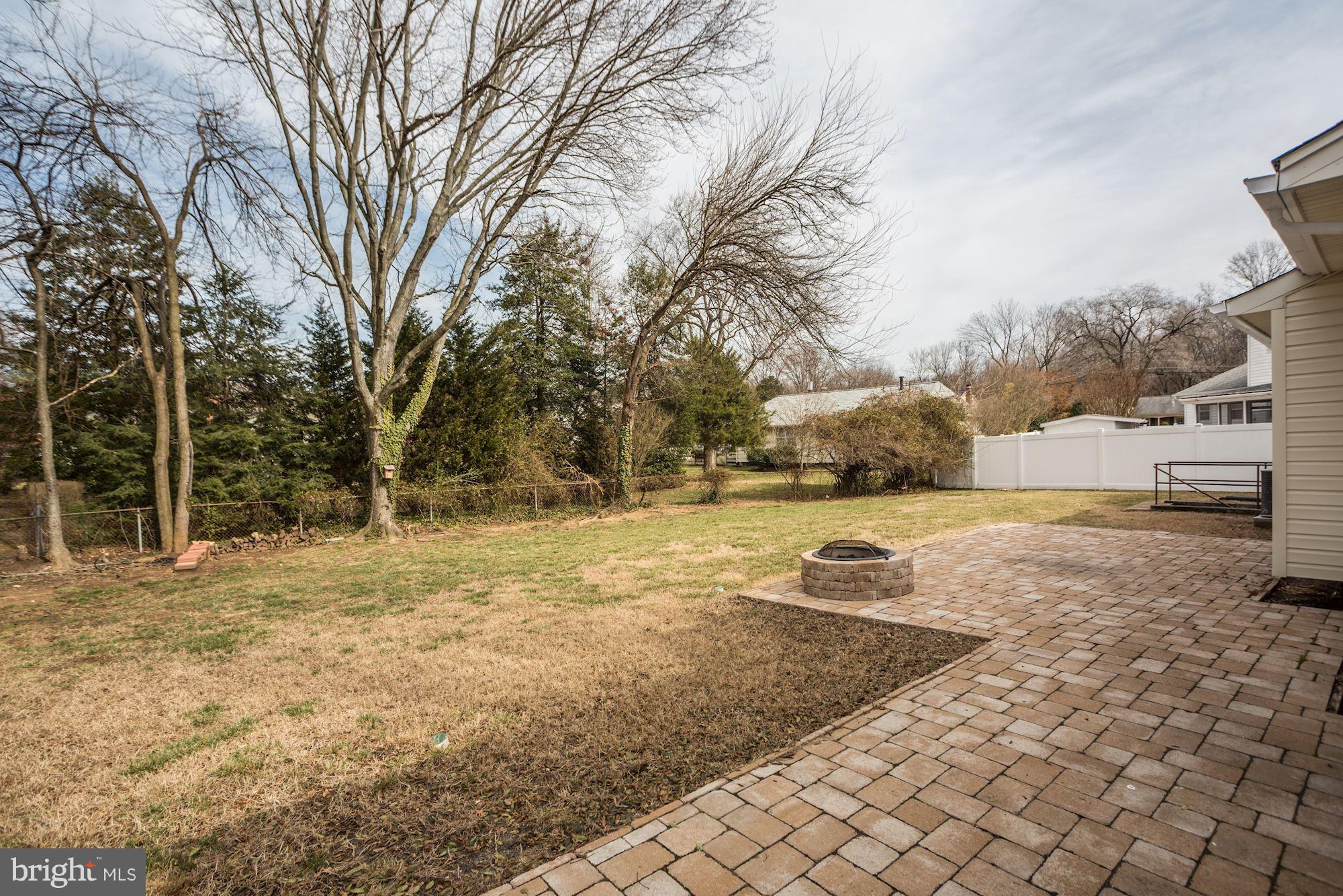 5502 Ashfield Road Alexandria, VA 22315 - Photo 26 of 27 Custom Patio with Firepit in Private Back Yard