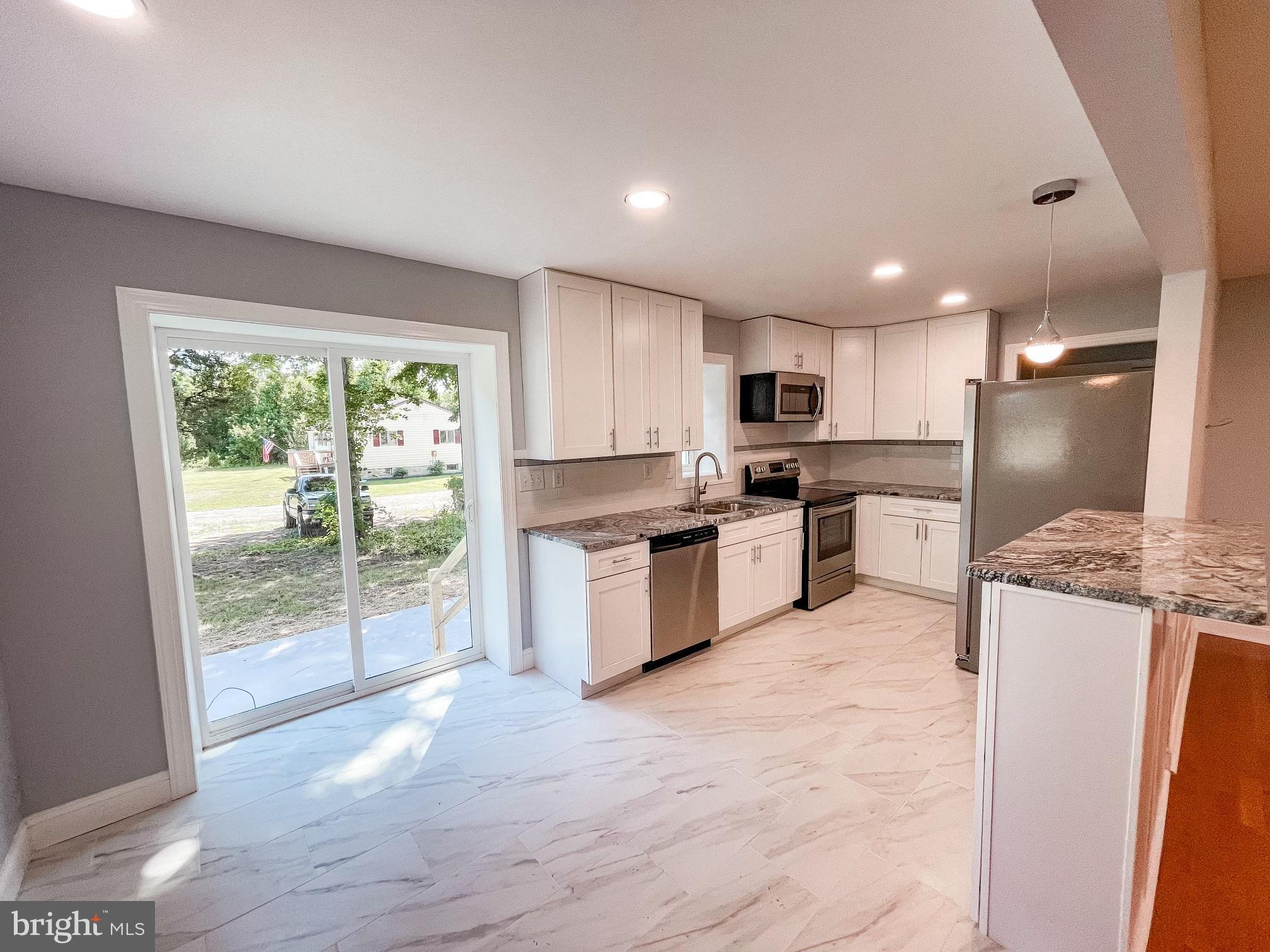 1160 Fieldsboro Road Townsend, DE 19734 - Photo 5 of 24 Kitchen with Slider to Back Patio