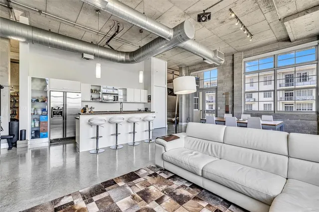 a living room with furniture and a couch