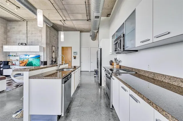 a view of balcony with a potted plant