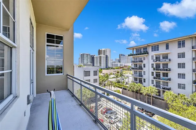 a view of a livingroom with gym equipment