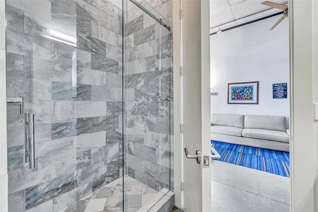 an aerial view of city with tall buildings