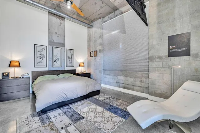 a bathroom with a double vanity sink toilet and shower