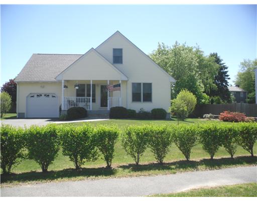 Exterior Front. FRONT HOUSE with nice Landscaping, driveway, and sidewalks.