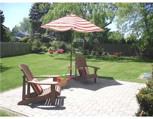 18 West View Road Middletown, RI 02842 - Photo 6 of 20 Exterior Front. PATIO and back yard with nice landscaping
