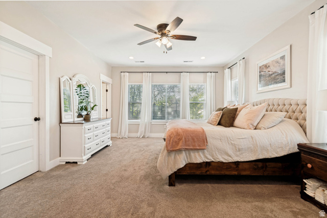 332 South 500 West Payson, UT 84651 - Photo 16 of 50 Spacious primary bedroom featuring neutral carpeting and light-toned walls