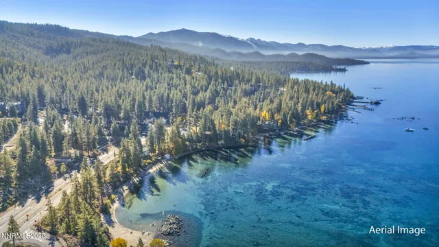 a view of a mountain with a mountain in the background