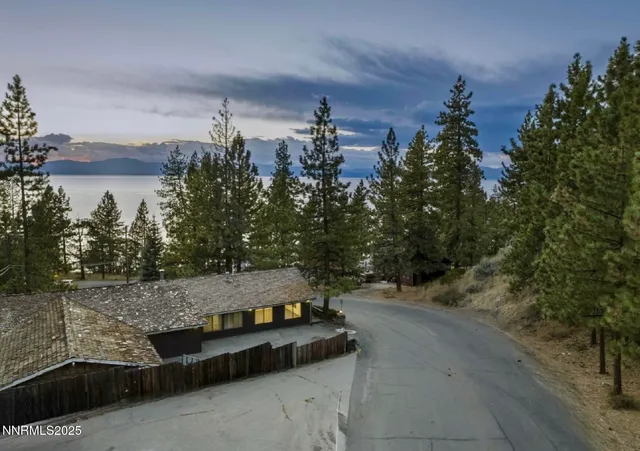 a view of a street with an outdoor space