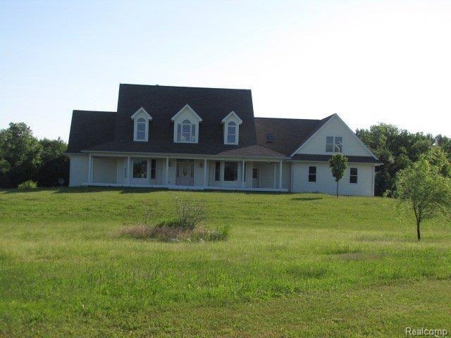 409 Elliott Road Fowlerville, MI 48836 - Photo 1 of 13 Front