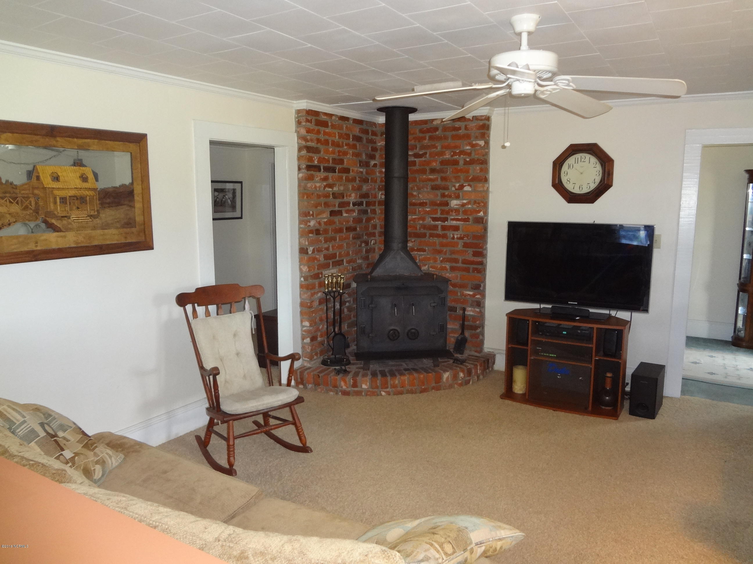 5726 Reedy Branch Road Winterville, NC 28590 - Photo 43 of 89 Wood Stove in Family Room