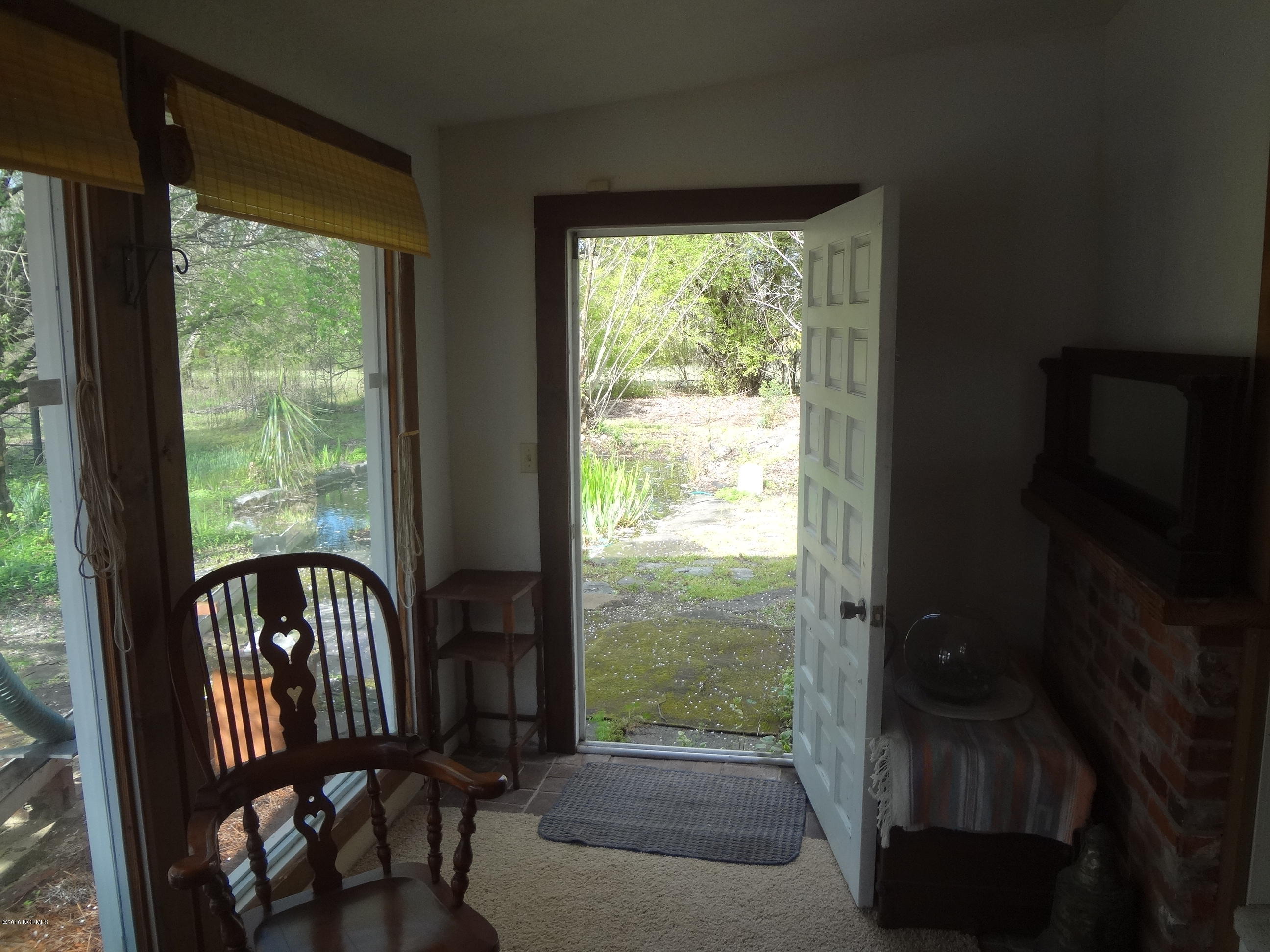 5726 Reedy Branch Road Winterville, NC 28590 - Photo 68 of 89 Sun Porch Door to Back Yard