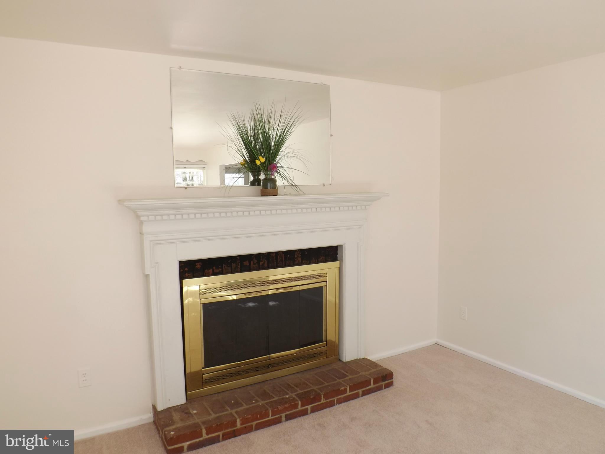 8418 Wagon Wheel Road Alexandria, VA 22309 - Photo 16 of 30 Wood burning fireplace in Living Room