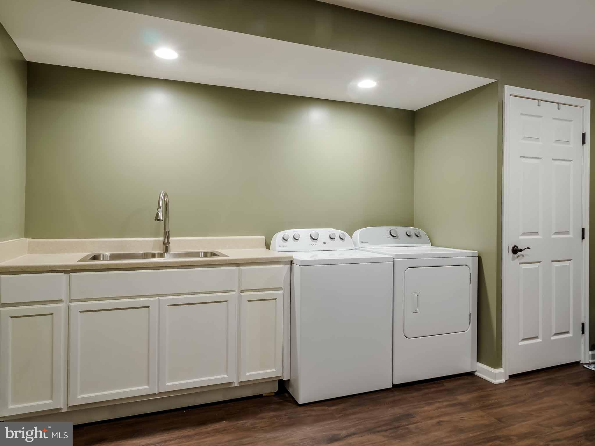 17364 Teagues Point Road Hughesville, MD 20637 - Photo 27 of 30 Huge laundry room with deep sink and cabinetry