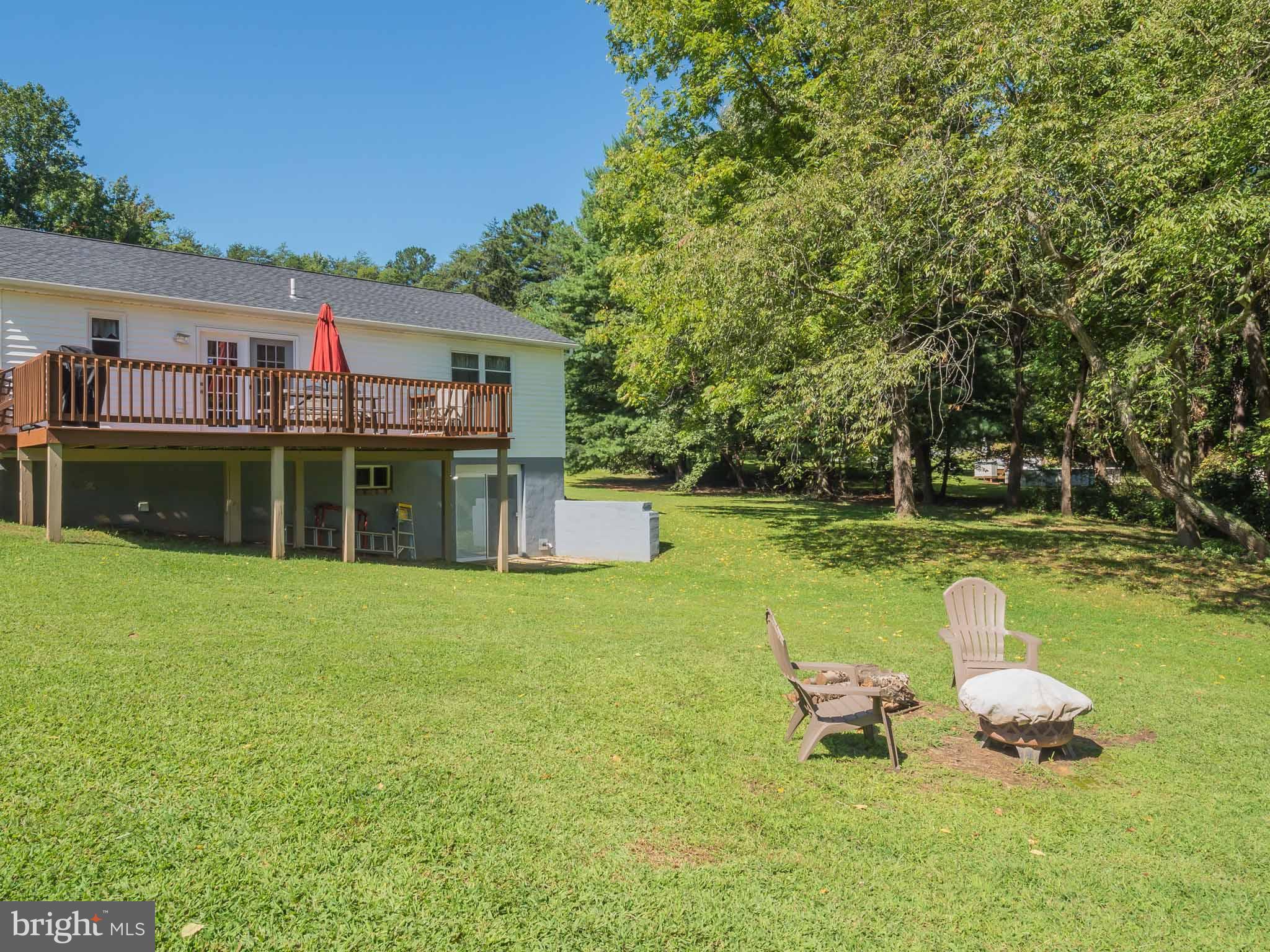 17364 Teagues Point Road Hughesville, MD 20637 - Photo 29 of 30 Relax in your back yard a tyour fire pit