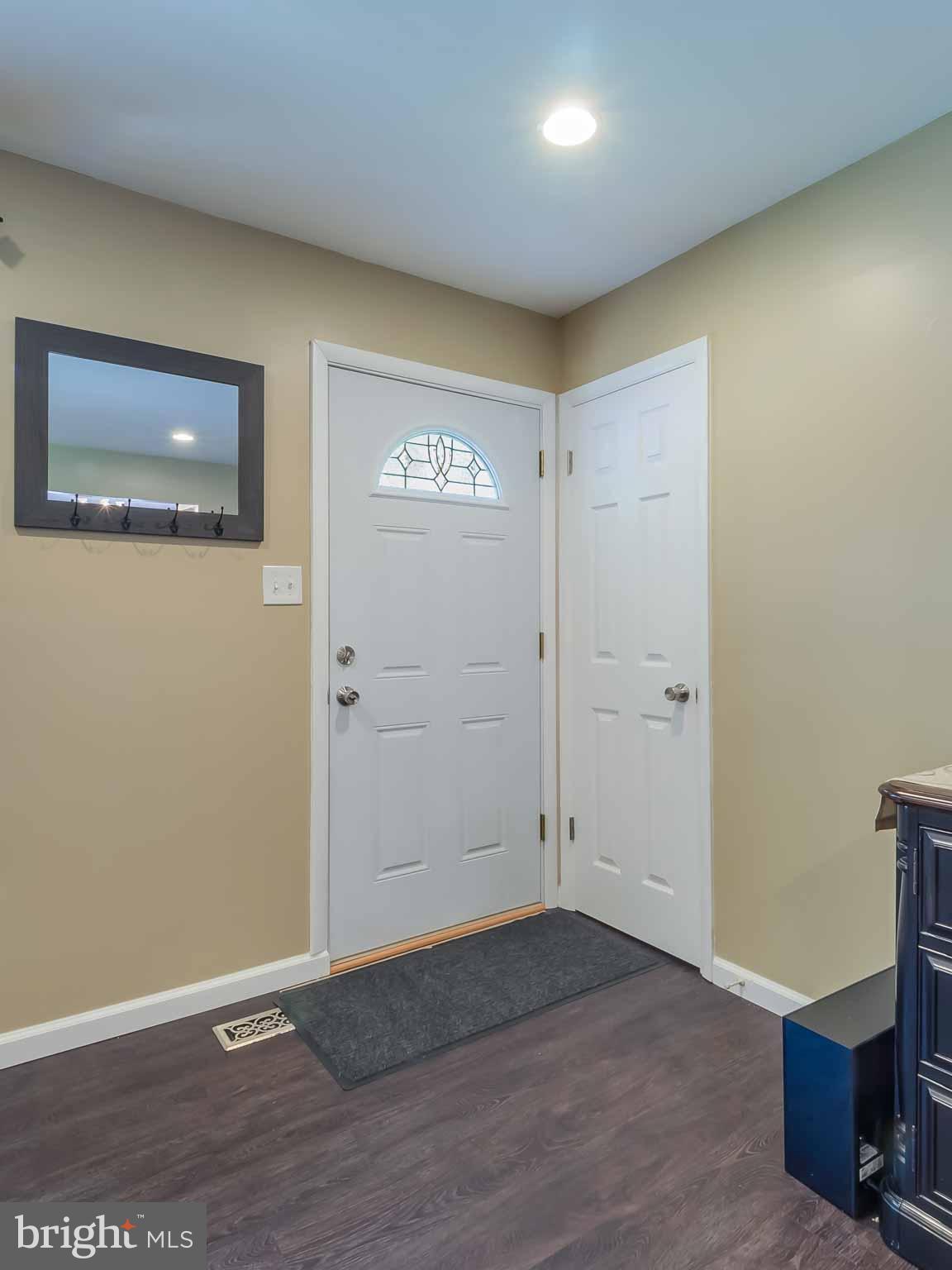 17364 Teagues Point Road Hughesville, MD 20637 - Photo 9 of 30 Front Door into living room