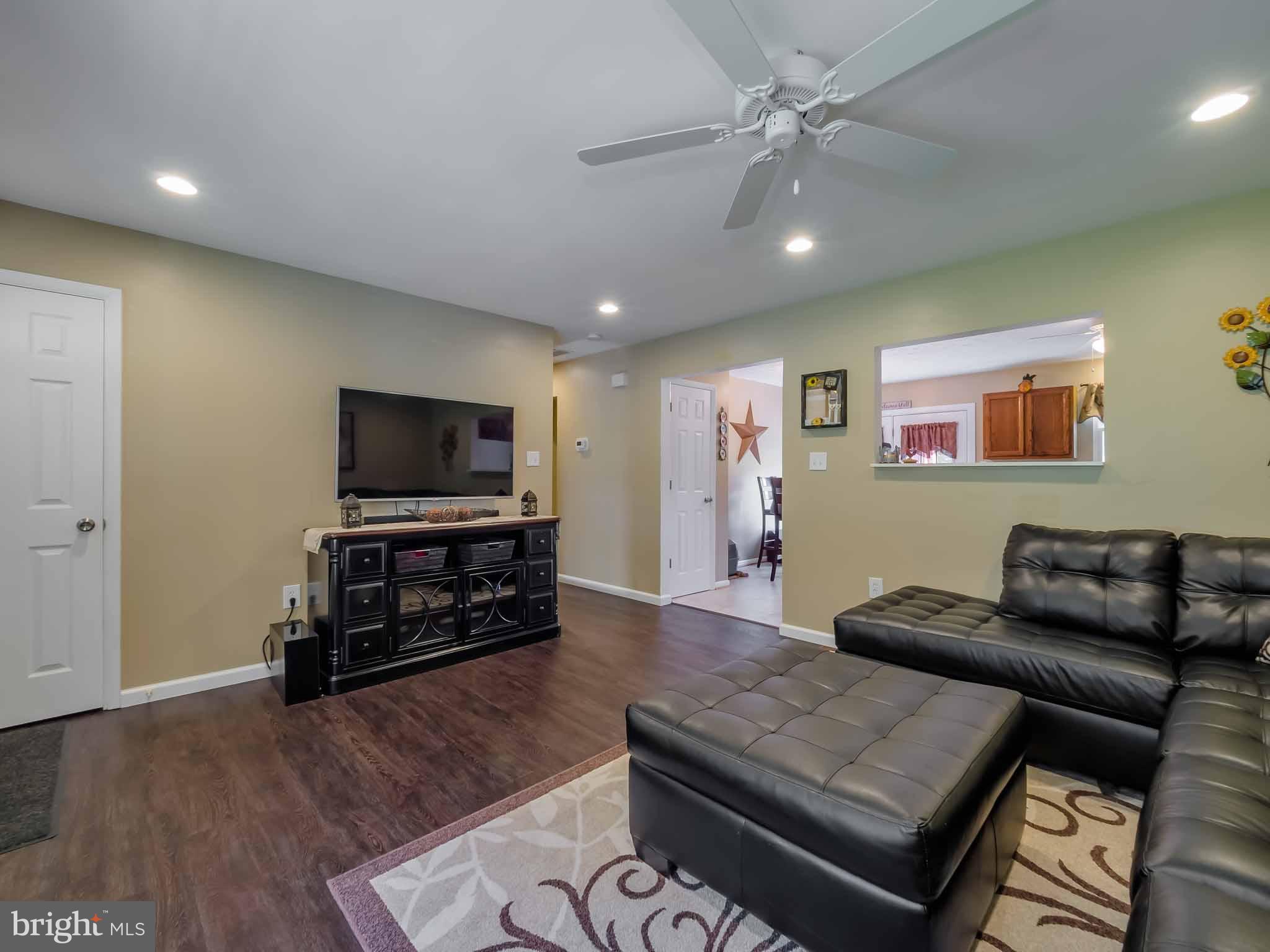17364 Teagues Point Road Hughesville, MD 20637 - Photo 10 of 30 New engineered flooring in Living room