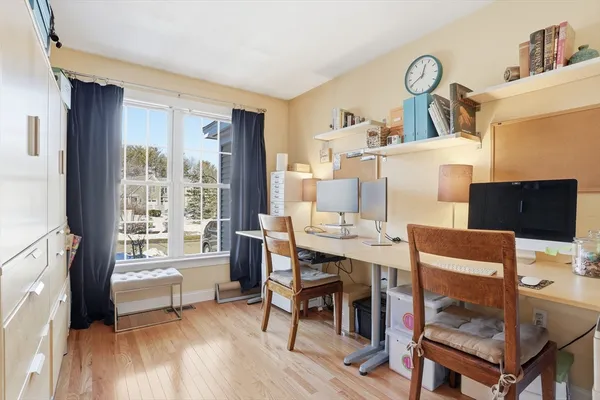 a workspace with furniture window and outside view