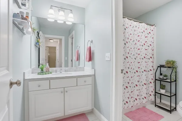 a bathroom with a sink a vanity and a mirror