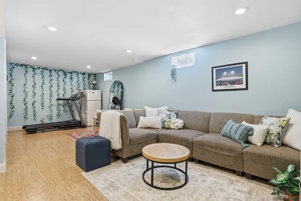 a living room with furniture and a couch