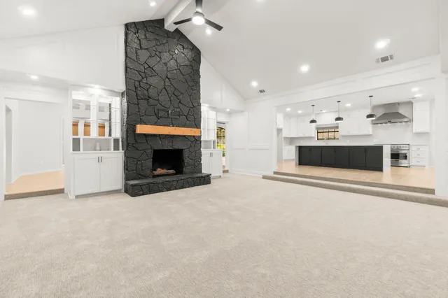 a bathroom with a shower and a sink