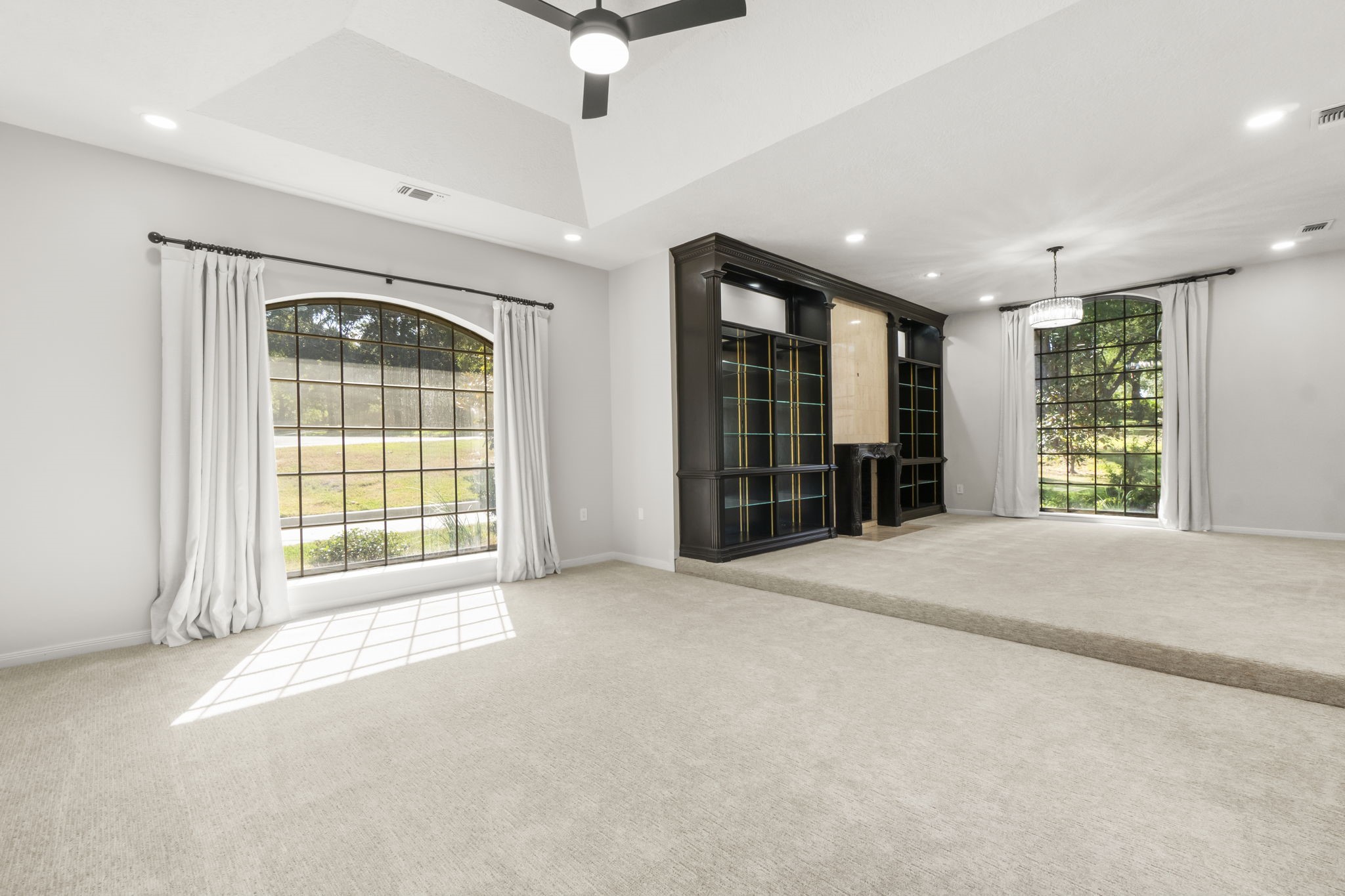 132 Mockingbird Lane Livingston, TX 77351 - Photo 22 of 50 a view of an empty room with a window and a kitchen