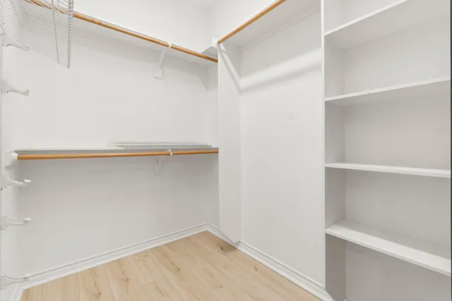 a view of a house with a yard and tree s