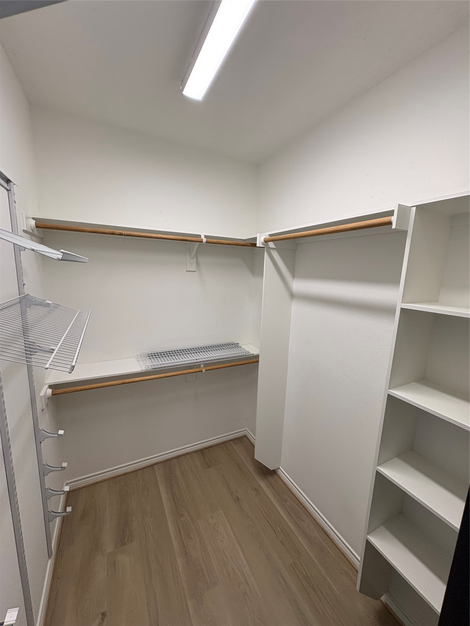 132 Mockingbird Lane Livingston, TX 77351 - Photo 29 of 50 a storage room with wooden floor
