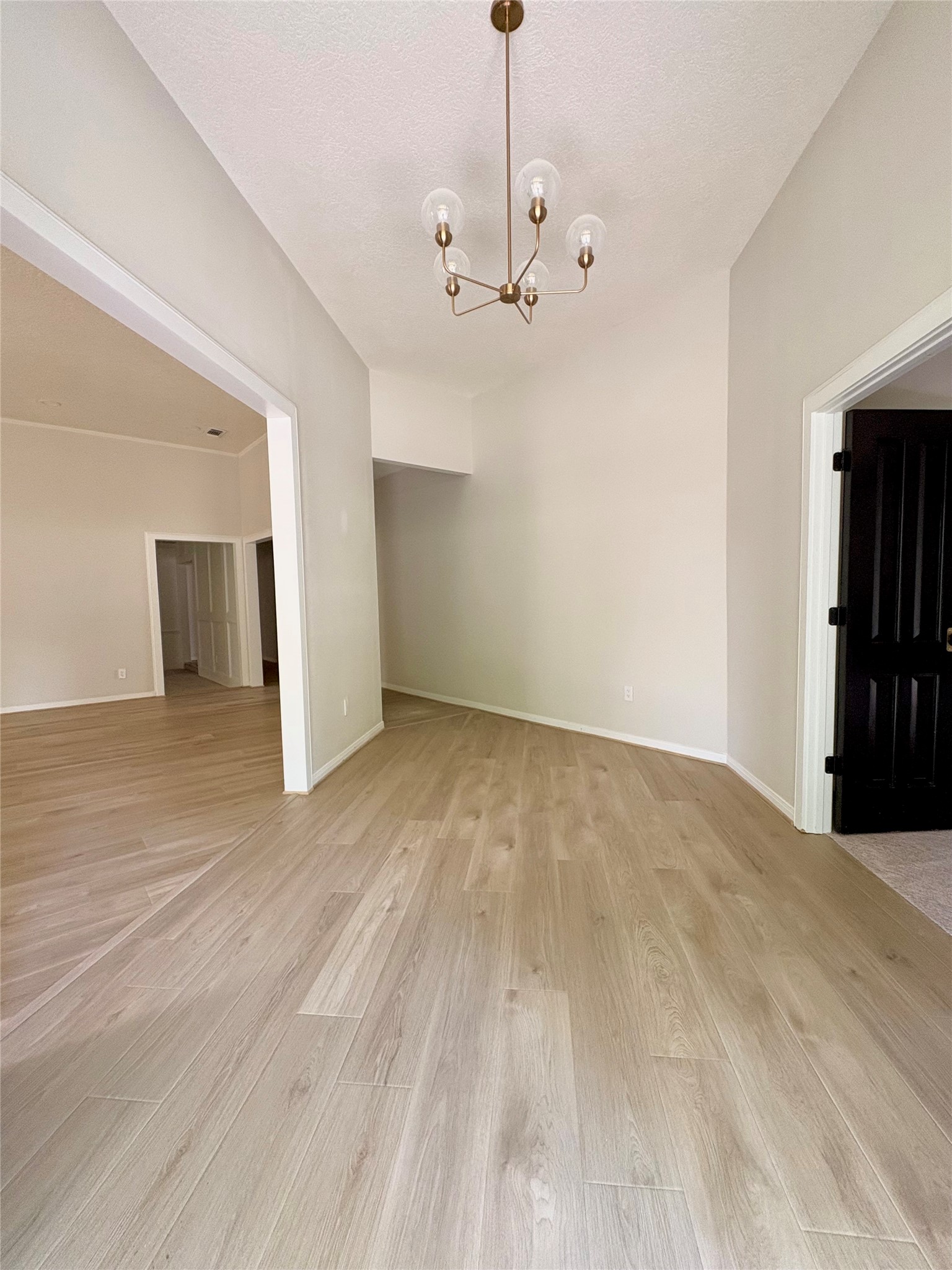 132 Mockingbird Lane Livingston, TX 77351 - Photo 3 of 50 a view of an empty room with wooden floor and a window