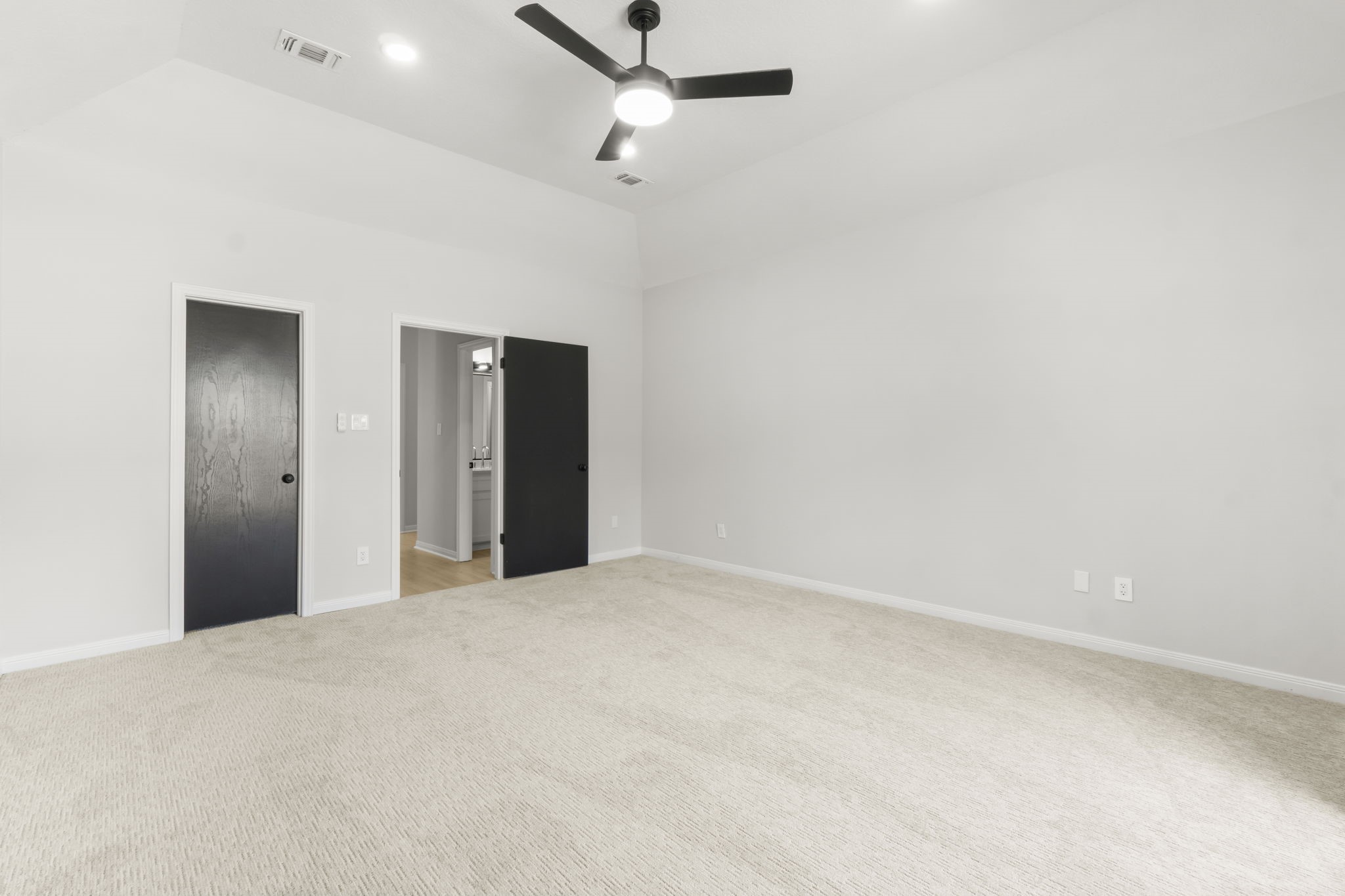 132 Mockingbird Lane Livingston, TX 77351 - Photo 36 of 50 a view of an empty room with a ceiling fan