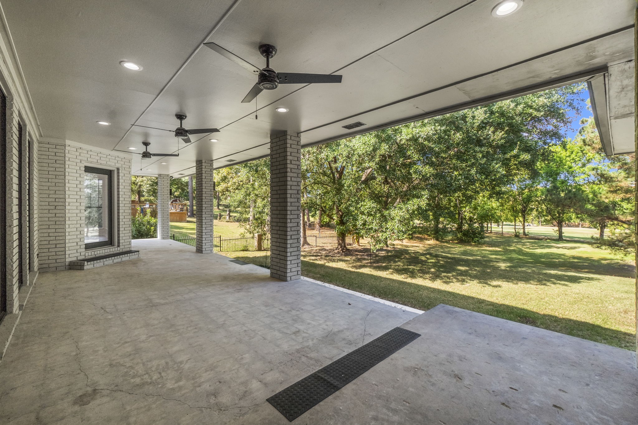 132 Mockingbird Lane Livingston, TX 77351 - Photo 44 of 50 Back Porch overlooking golf course