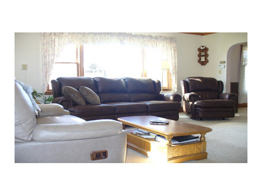 15236 Prairie Road South Beloit, IL 61080 - Photo 6 of 11 a living room with furniture and a window