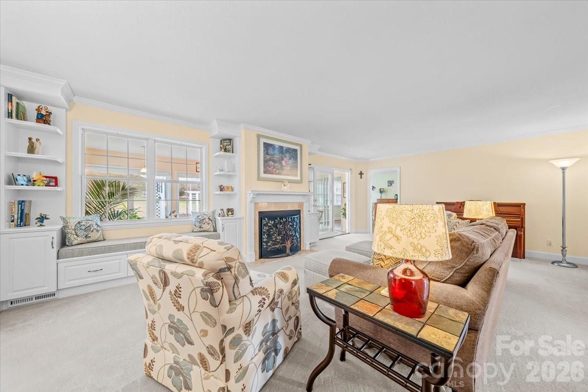 16601 Jefferson Place Fort Mill, SC 29708 - Photo 11 of 45 a living room with furniture and a fireplace