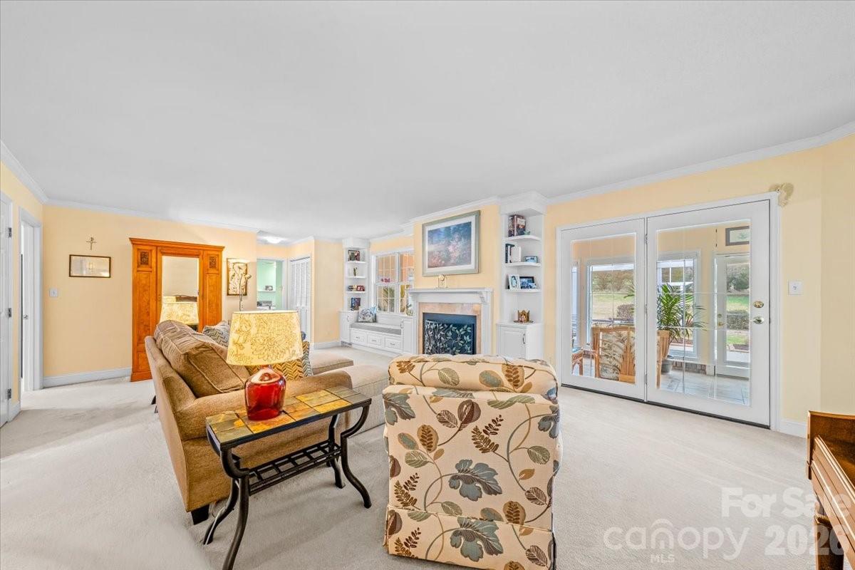 16601 Jefferson Place Fort Mill, SC 29708 - Photo 13 of 45 a living room with furniture and large windows