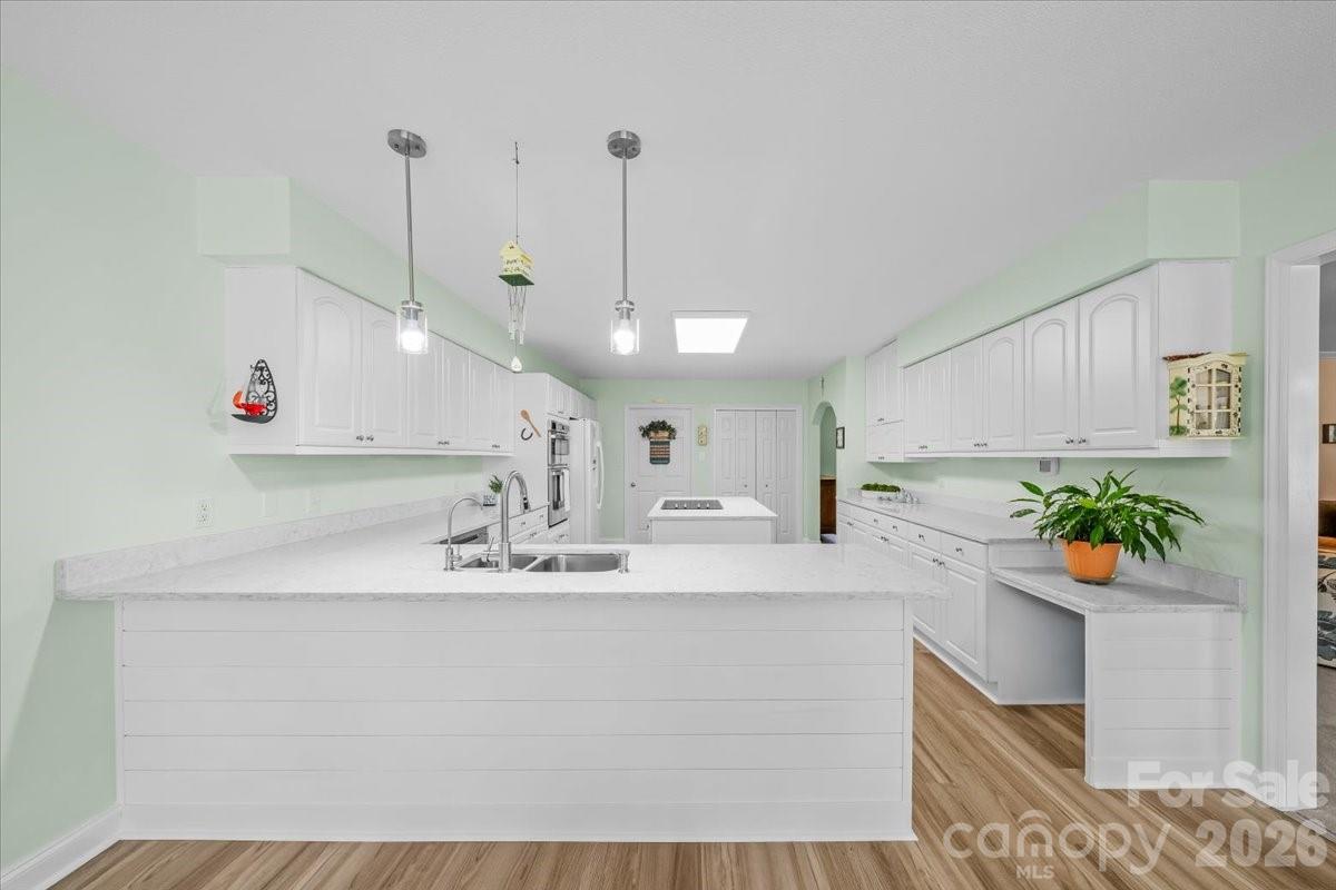 16601 Jefferson Place Fort Mill, SC 29708 - Photo 19 of 45 a bathroom with a sink a mirror and a shower