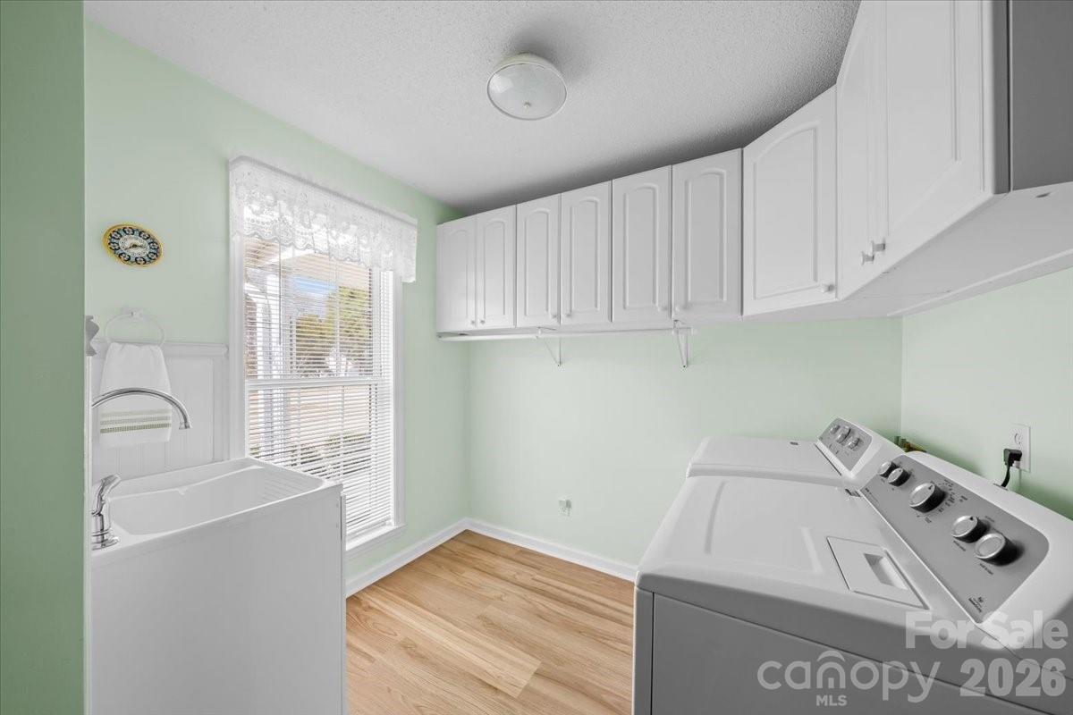 16601 Jefferson Place Fort Mill, SC 29708 - Photo 23 of 45 a view of storage and utility room with washer and dryer