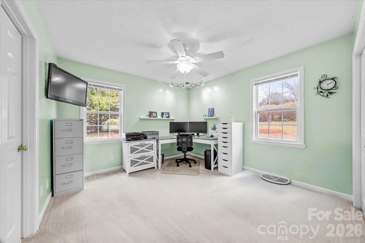 16601 Jefferson Place Fort Mill, SC 29708 - Photo 25 of 45 a view of a livingroom with furniture and a window
