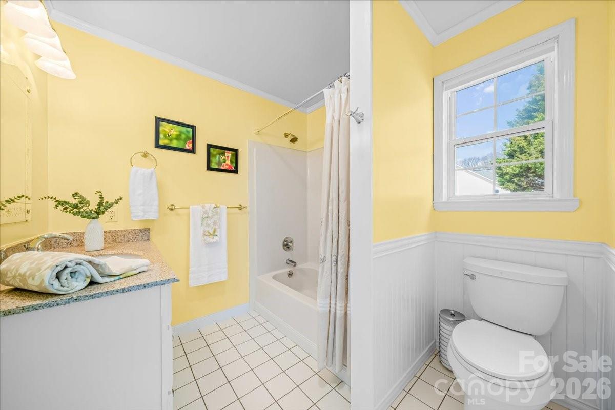16601 Jefferson Place Fort Mill, SC 29708 - Photo 26 of 45 a bathroom with a granite countertop sink toilet and shower