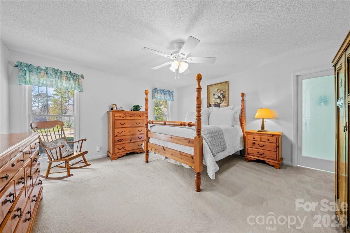 16601 Jefferson Place Fort Mill, SC 29708 - Photo 27 of 45 a bedroom with furniture and window