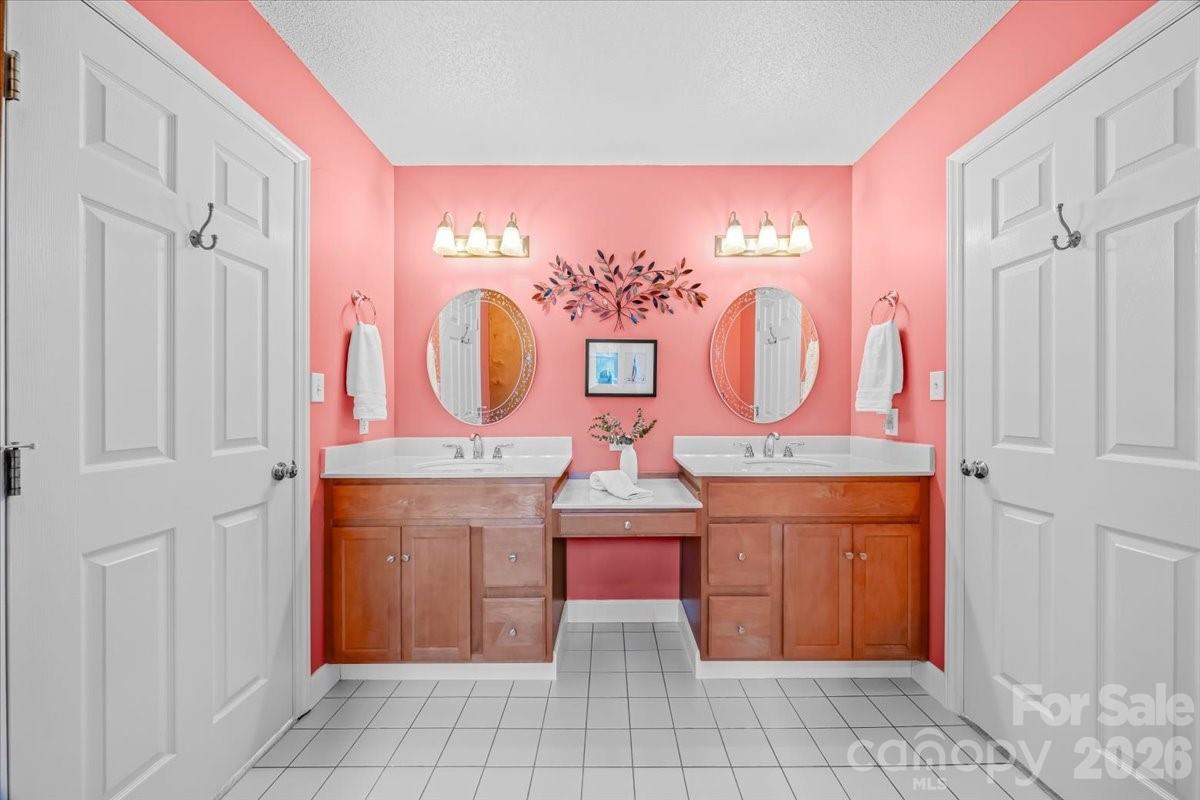 16601 Jefferson Place Fort Mill, SC 29708 - Photo 35 of 45 a bathroom with a sink and a mirror