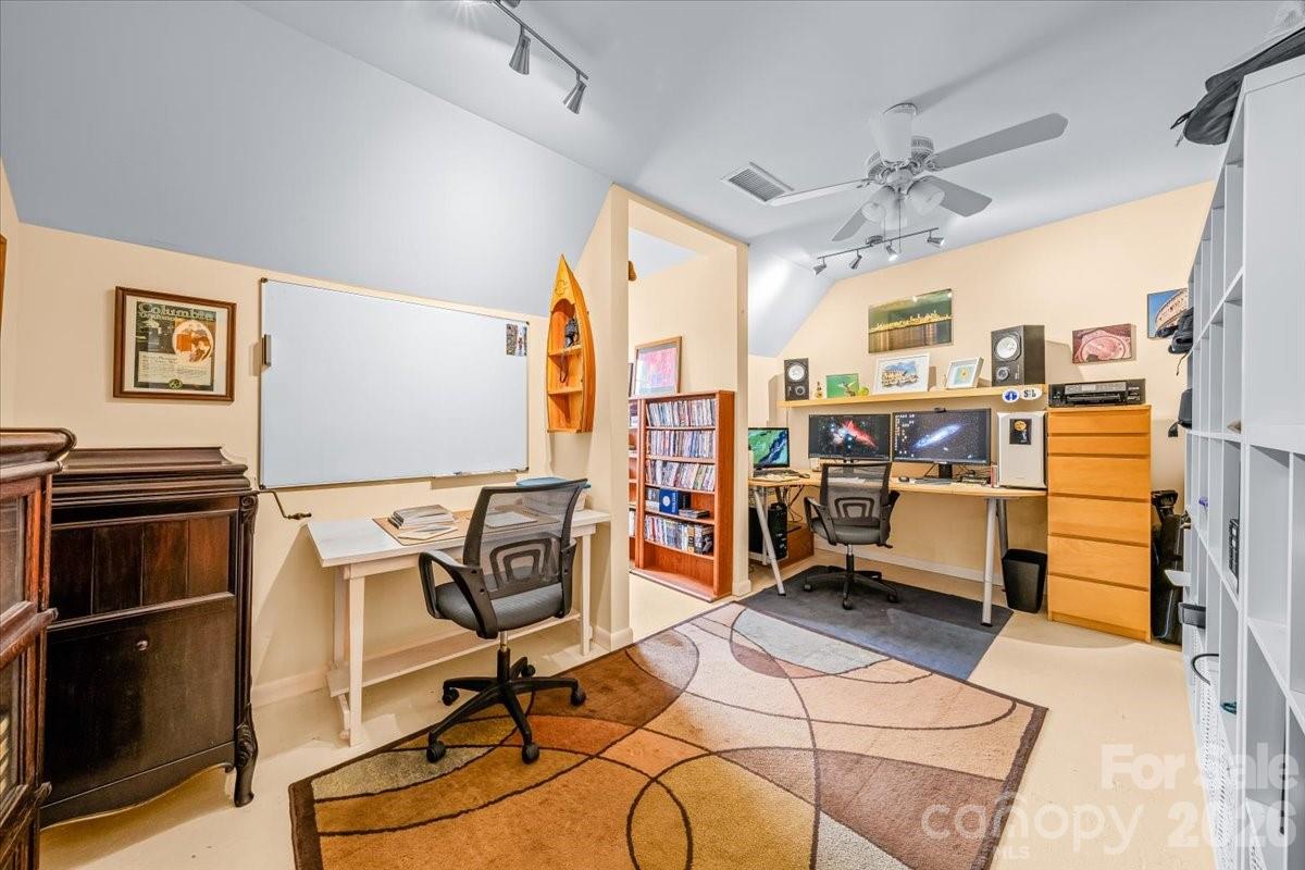 16601 Jefferson Place Fort Mill, SC 29708 - Photo 36 of 45 a view of a livingroom with workspace and a window