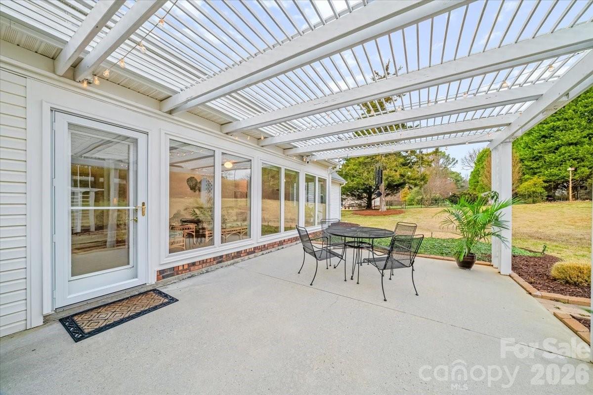 16601 Jefferson Place Fort Mill, SC 29708 - Photo 40 of 45 a balcony with furniture and a large window