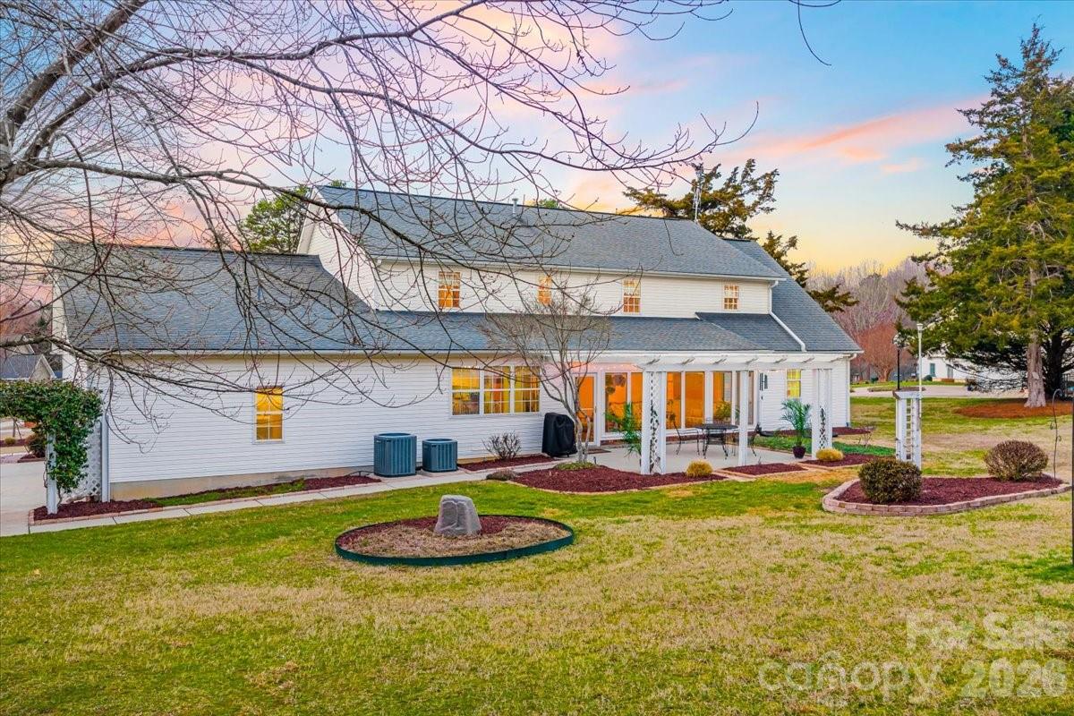 16601 Jefferson Place Fort Mill, SC 29708 - Photo 42 of 45 a view of a house with swimming pool and a yard