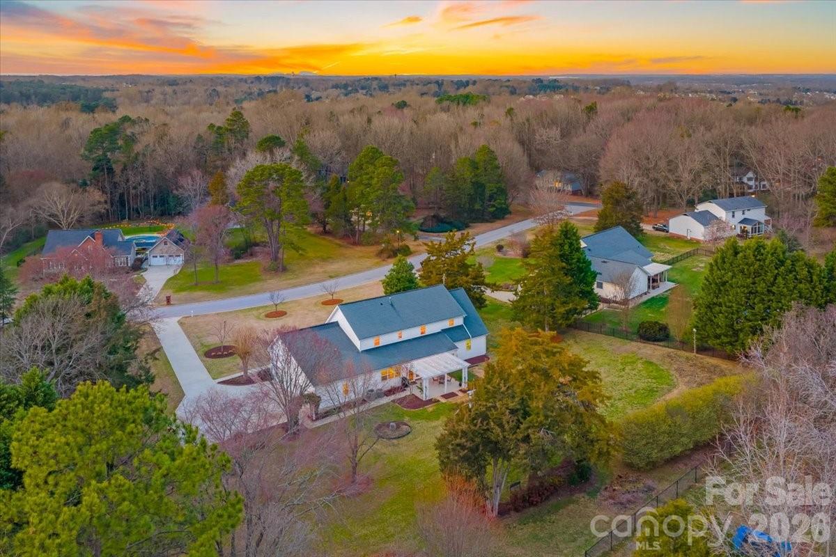 16601 Jefferson Place Fort Mill, SC 29708 - Photo 44 of 45 an aerial view of a house with a garden