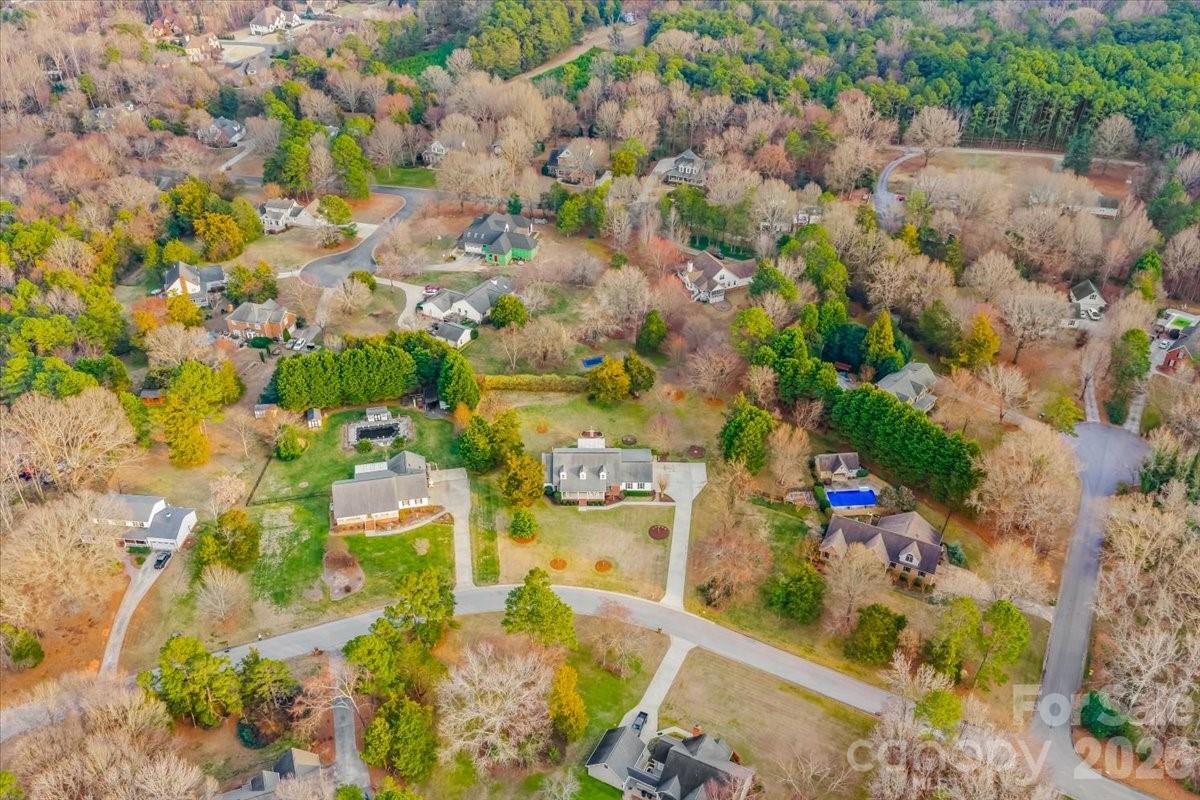 16601 Jefferson Place Fort Mill, SC 29708 - Photo 45 of 45 an aerial view of residential houses with outdoor space