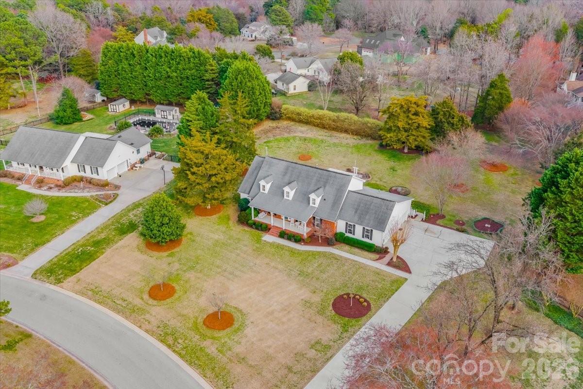 16601 Jefferson Place Fort Mill, SC 29708 - Photo 5 of 45 an aerial view of a house with a swimming pool