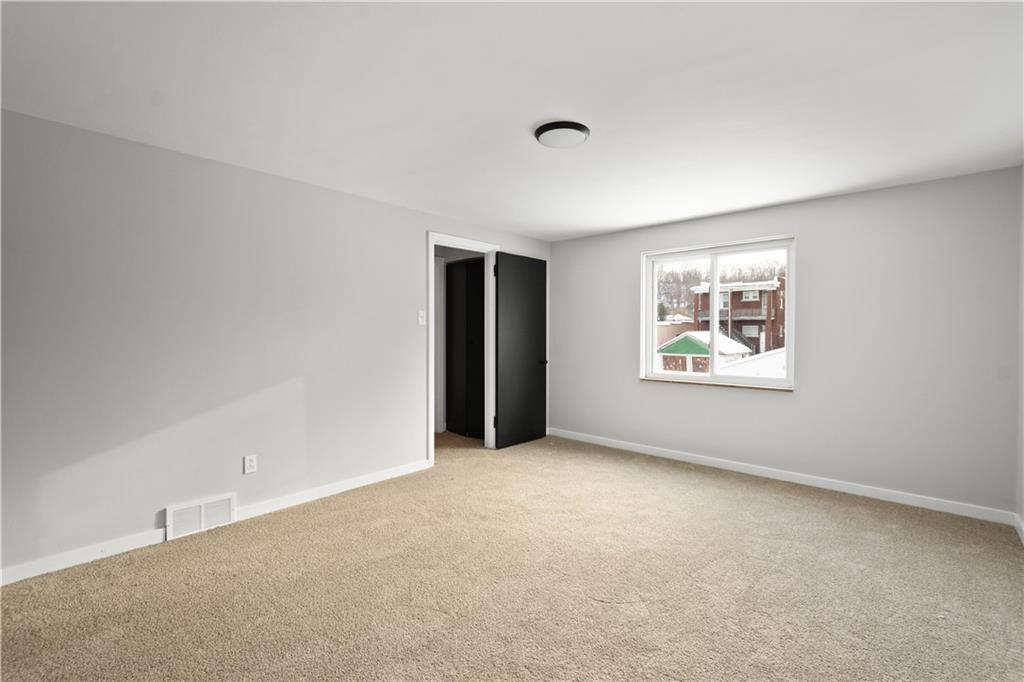 1613 Clarkton Street Pittsburgh, PA 15204 - Photo 13 of 23 a view of an empty room with a window